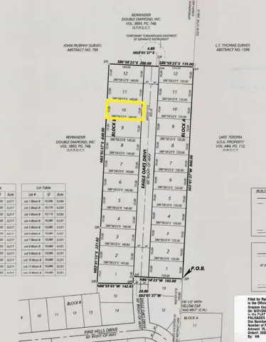 a outdoor space with lots of chairs and a table