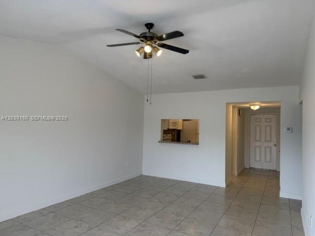 11206 Southwest 125th Place, Unit 11206 Miami, FL 33186 - Photo 5 of 15 a view of an empty room