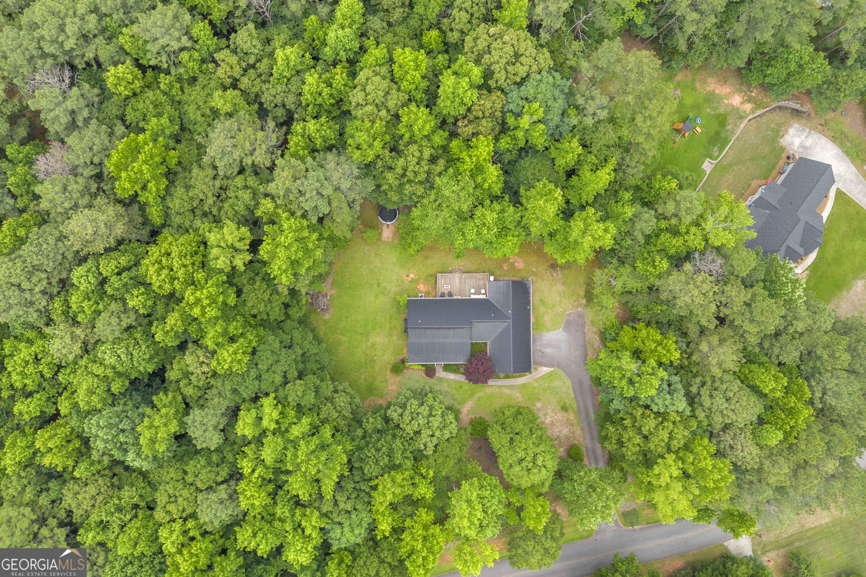 163 Tuxedo Drive Commerce, GA 30530 - Photo 61 of 62 a view of a house with a tree