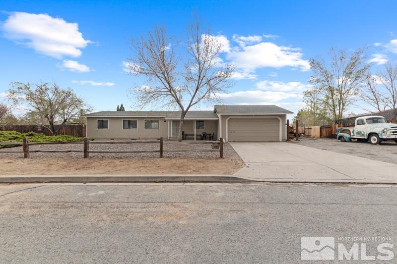 3885 Puffin Street Reno, NV 89508 - Photo 1 of 18 a view of house with a yard