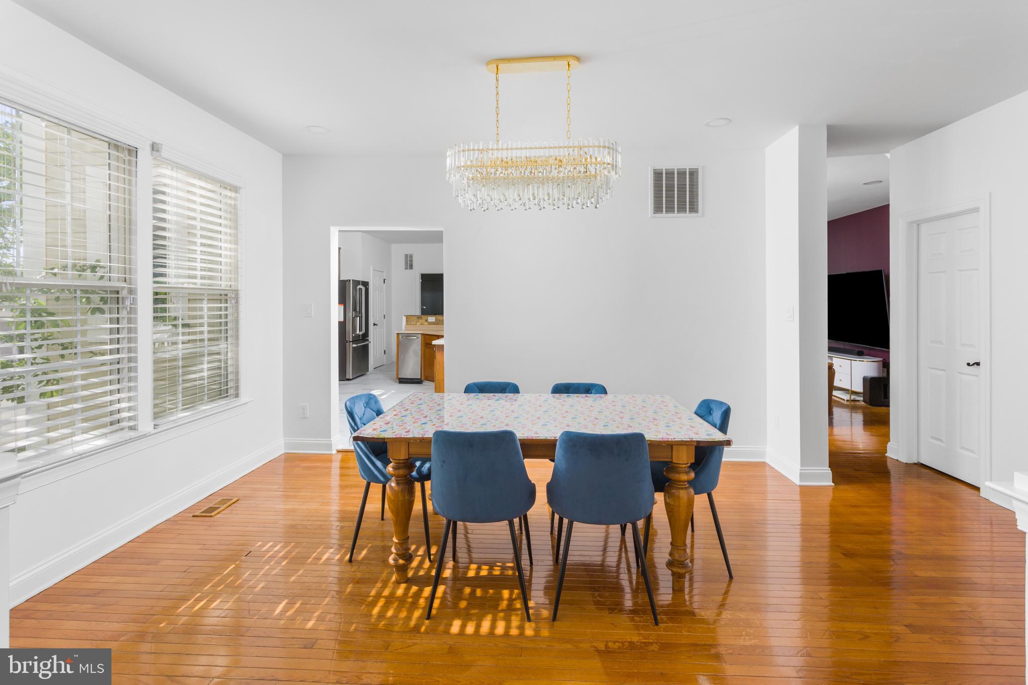 6 Hulse Street Robbinsville, NJ 08691 - Photo 12 of 75 a view of a dining room with furniture and wooden floor