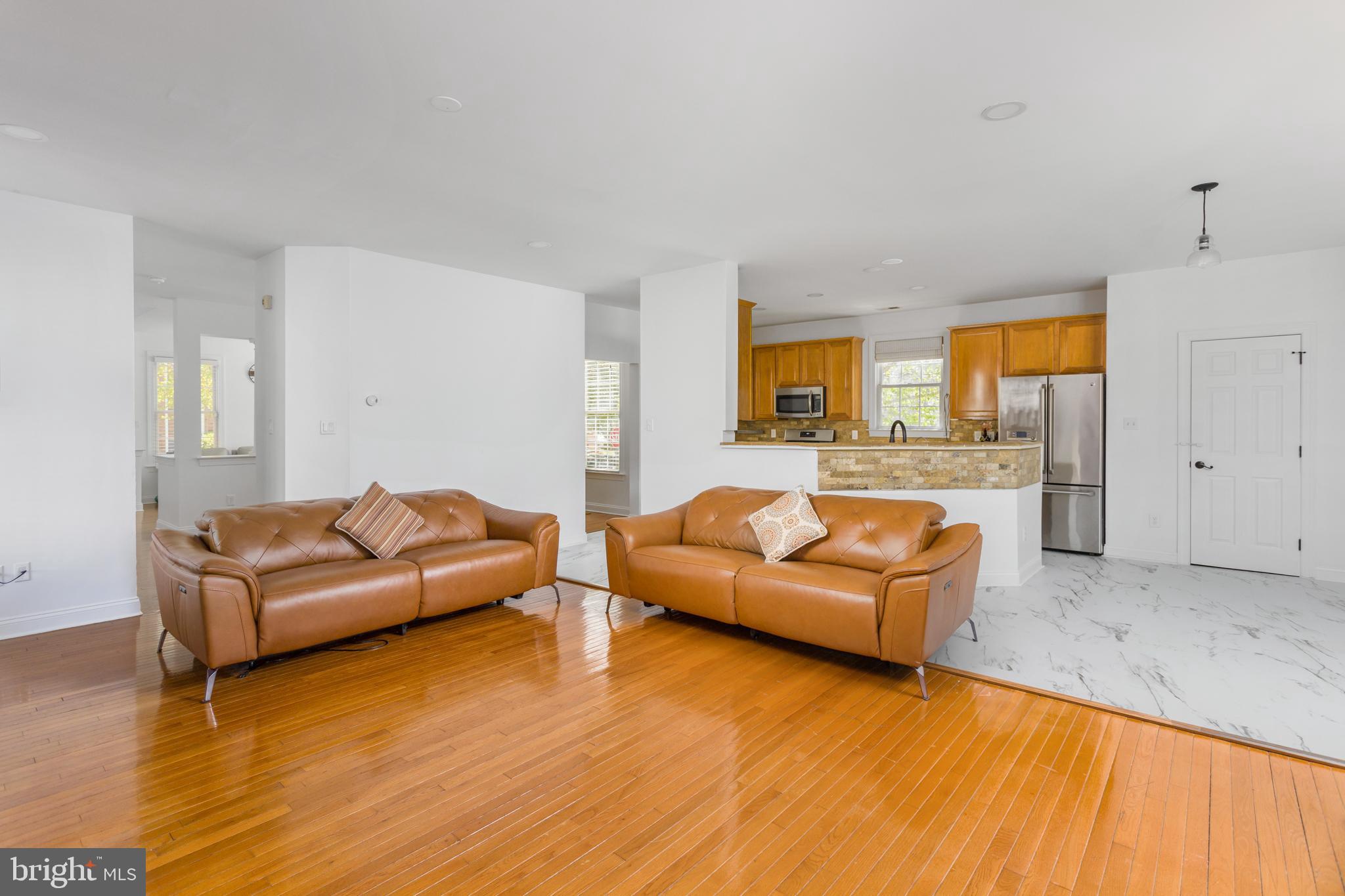 6 Hulse Street Robbinsville, NJ 08691 - Photo 15 of 75 a living room with furniture and a large window