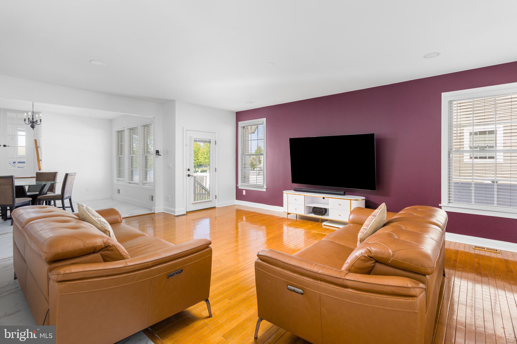 6 Hulse Street Robbinsville, NJ 08691 - Photo 17 of 75 a living room with furniture and a flat screen tv