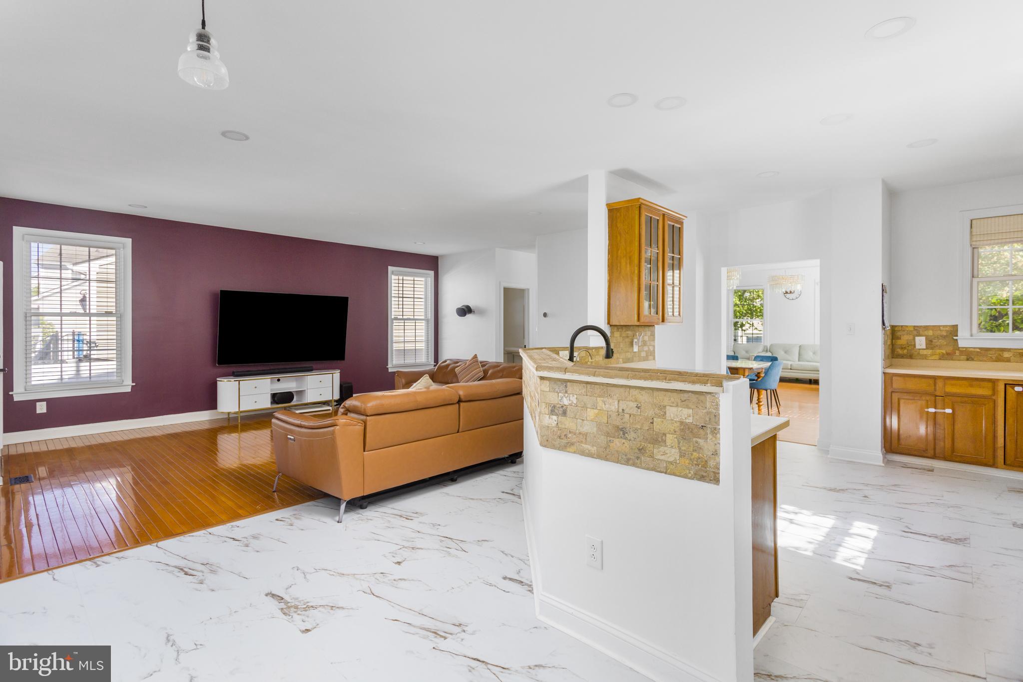 6 Hulse Street Robbinsville, NJ 08691 - Photo 19 of 75 a living room with furniture and a flat screen tv