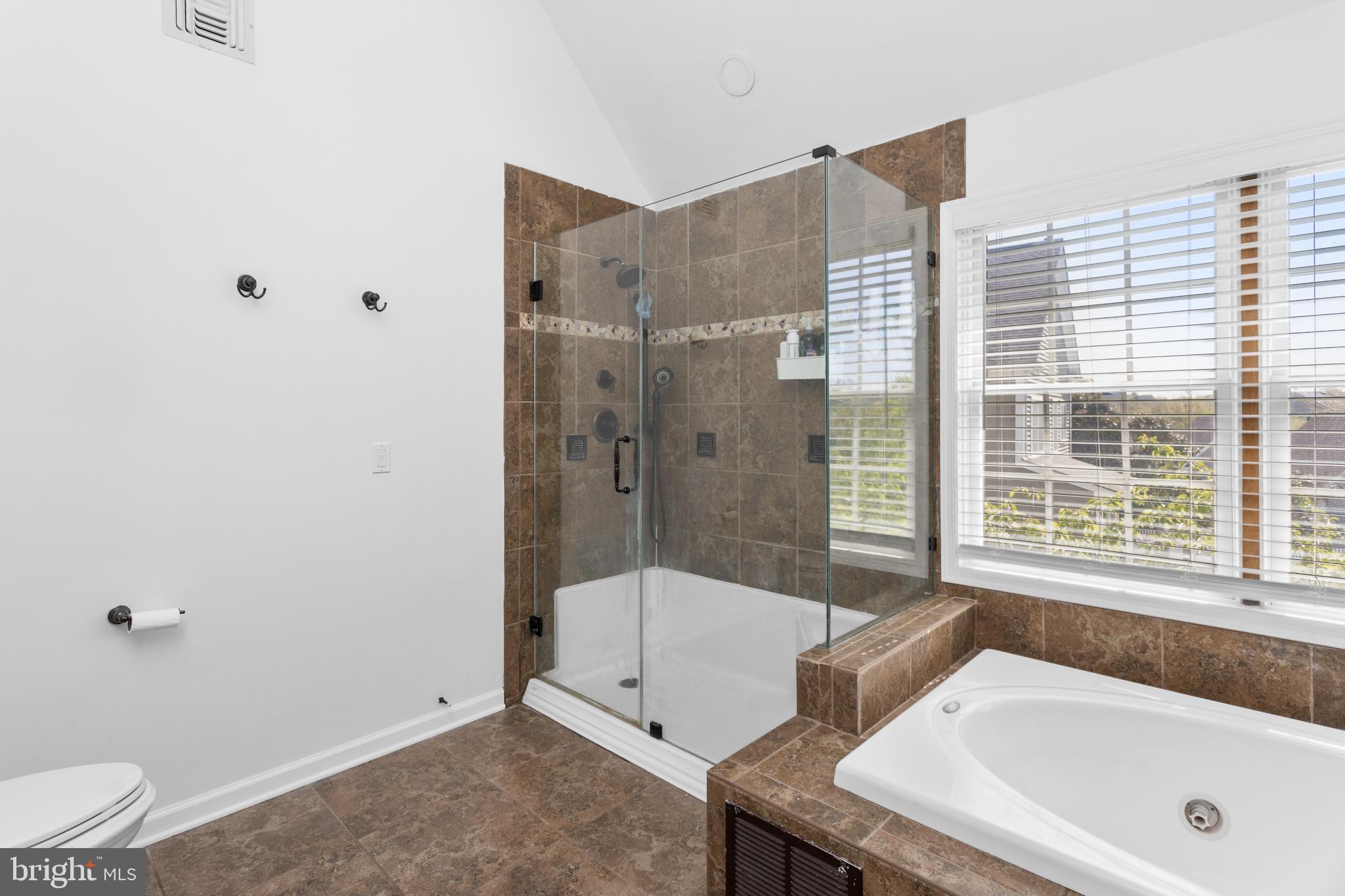 6 Hulse Street Robbinsville, NJ 08691 - Photo 45 of 75 a bathroom with a tub a toilet and a sink
