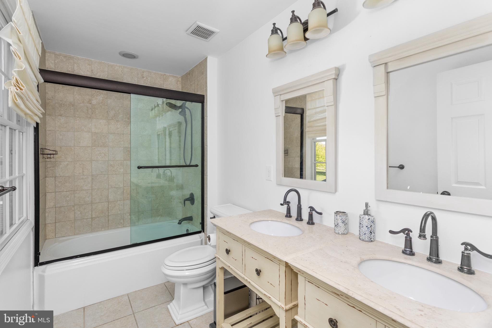 6 Hulse Street Robbinsville, NJ 08691 - Photo 53 of 75 a bathroom with a granite countertop sink toilet and shower