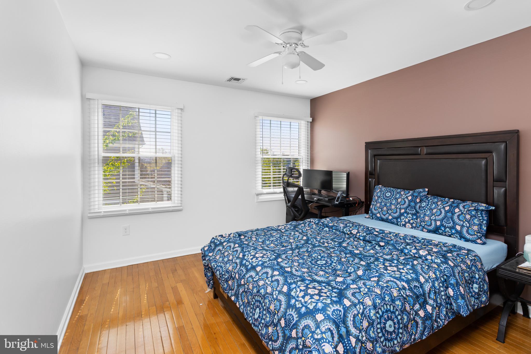 6 Hulse Street Robbinsville, NJ 08691 - Photo 54 of 75 a bedroom with a large bed and a chandelier