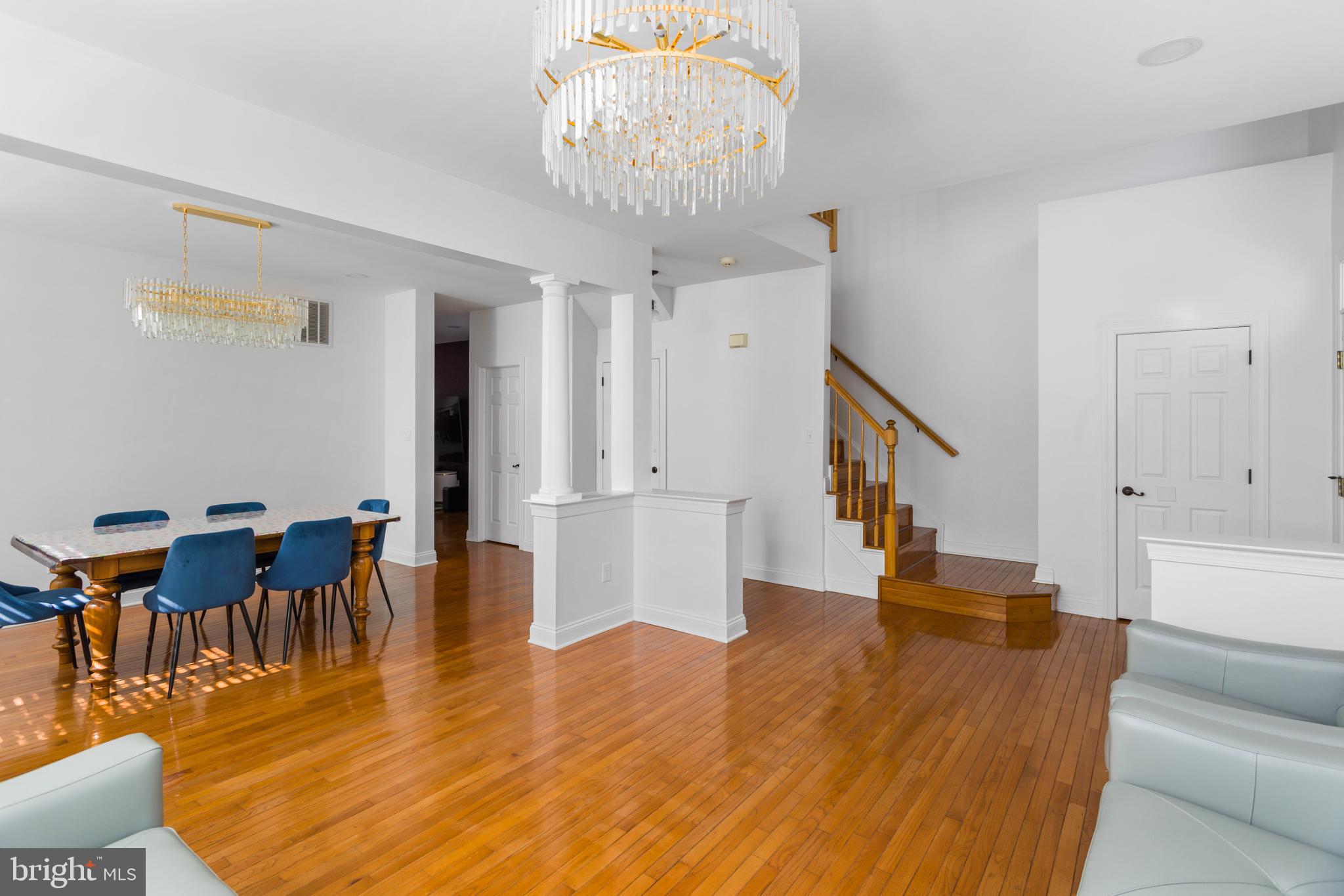 6 Hulse Street Robbinsville, NJ 08691 - Photo 10 of 75 a living room with furniture and a chandelier