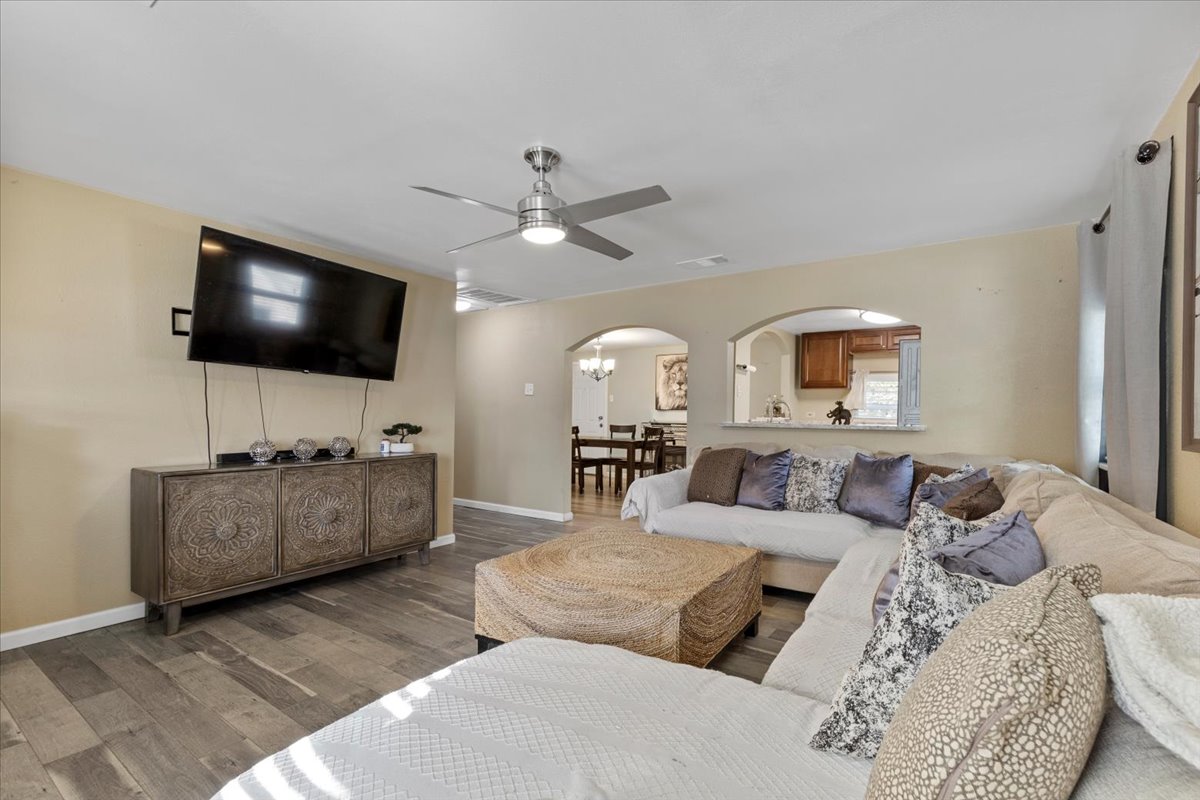 240 Riddle Road Cedar Creek, TX 78612 - Photo 13 of 31 a living room with furniture and a flat screen tv