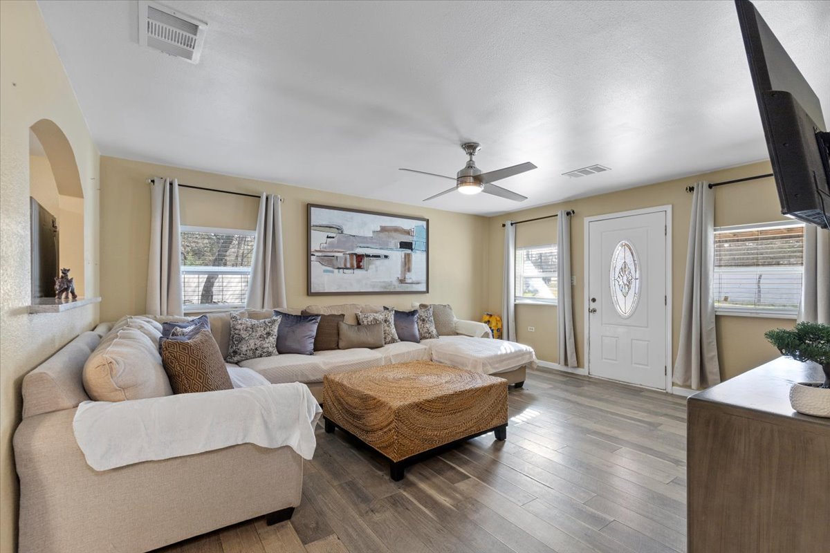 240 Riddle Road Cedar Creek, TX 78612 - Photo 15 of 31 a living room with furniture and a large window