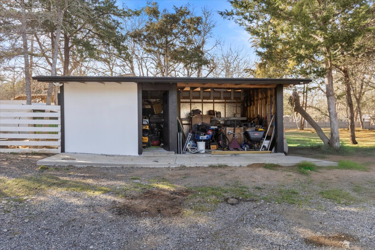 240 Riddle Road Cedar Creek, TX 78612 - Photo 24 of 31 a view of a house with backyard