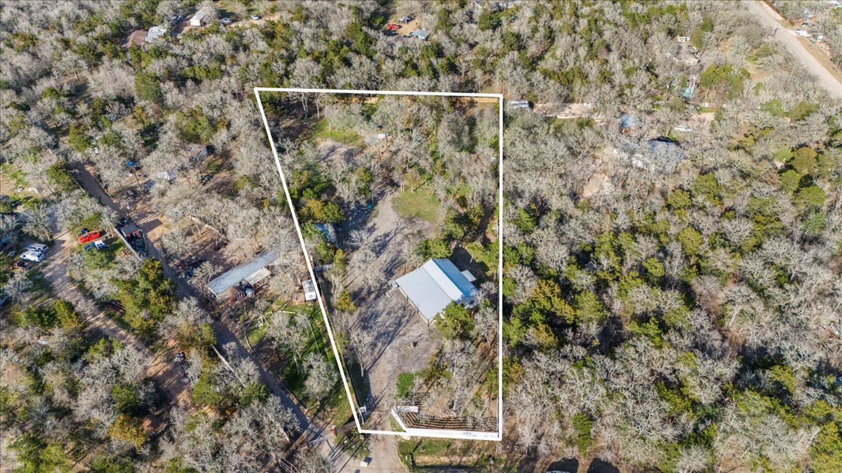 240 Riddle Road Cedar Creek, TX 78612 - Photo 31 of 31 a view of a door and an outdoor space