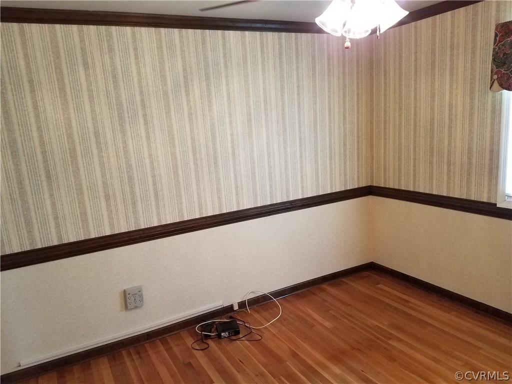 13104 South Chester Road Chester, VA 23831 - Photo 11 of 28 a view of a room with wooden floor
