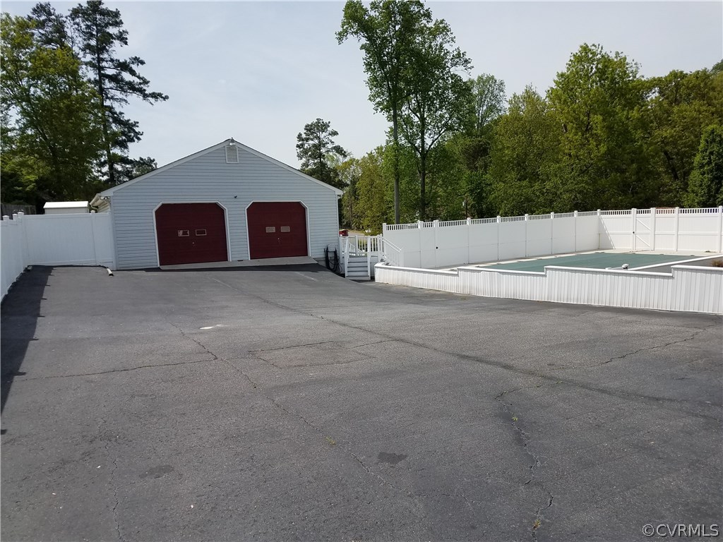 13104 South Chester Road Chester, VA 23831 - Photo 24 of 28 a view of a house with a yard