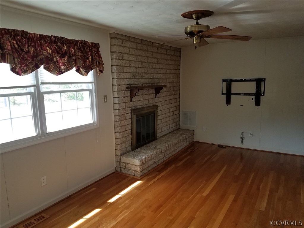 13104 South Chester Road Chester, VA 23831 - Photo 7 of 28 a view of a living room with a fireplace