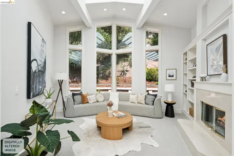 a spacious bedroom with a bed a mirror and furniture