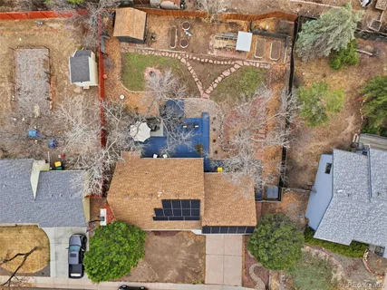 an aerial view of residential houses with outdoor space