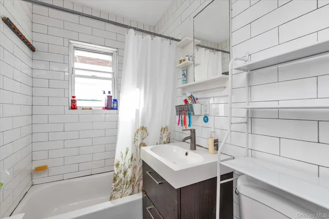 a bathroom with a sink and a shower