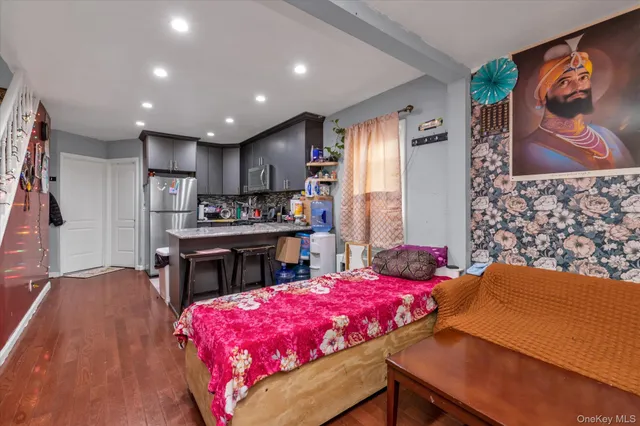 a bedroom with a bed and a table in it