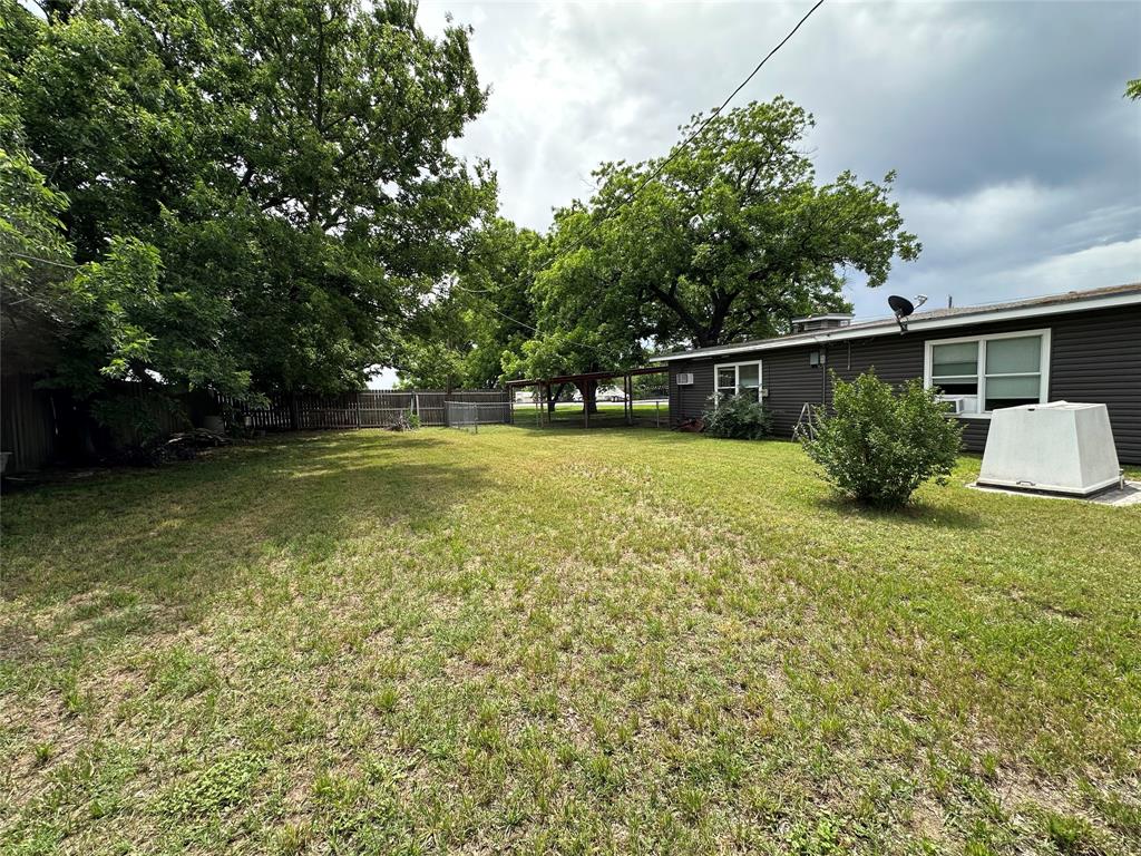 7350 Highway 67, Unit 377N Comanche, TX 76442 - Photo 8 of 13 a view of a garden