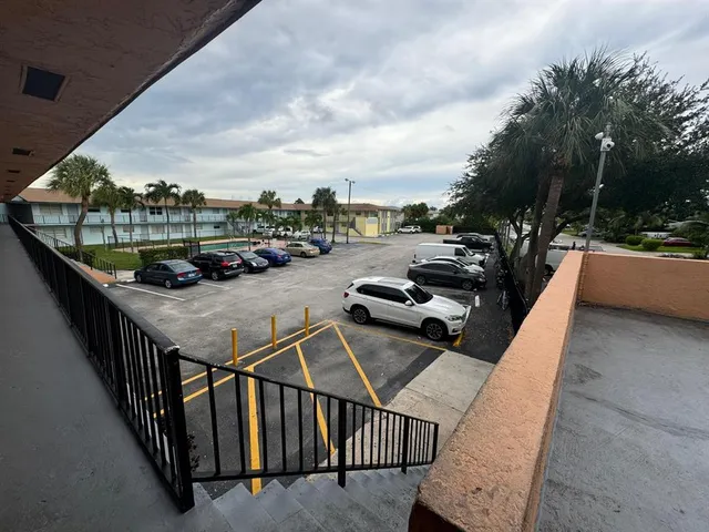 a view of a balcony with city view