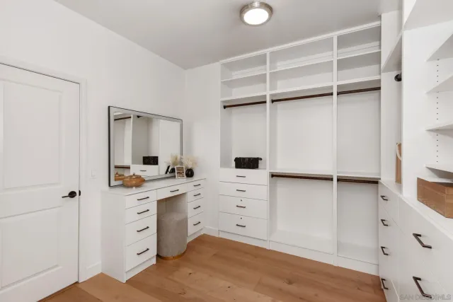 a view of cabinets and window