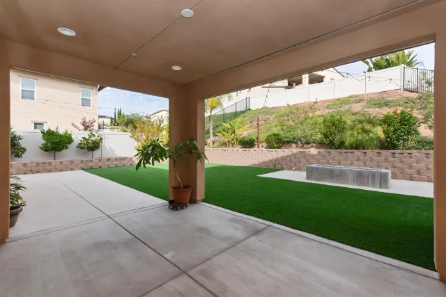 a view of a porch with garden