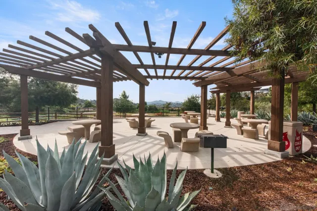 a view of patio with swimming pool