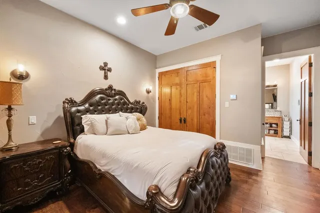 a living room with furniture a window and a flat screen tv