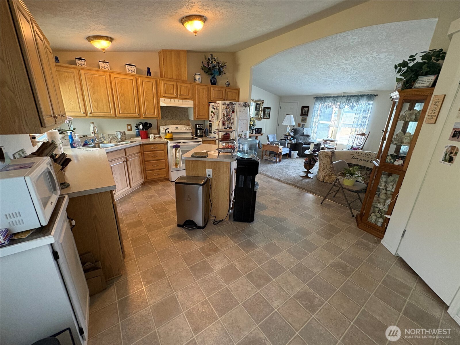 51 Meander Way Aberdeen, WA 98520 - Photo 8 of 22 a view of kitchen with sink refrigerator stove and window