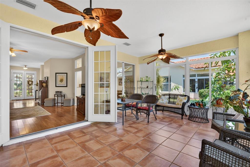 4266 Summertree Road Venice, FL 34293 - Photo 6 of 64 a view of a livingroom with furniture and window