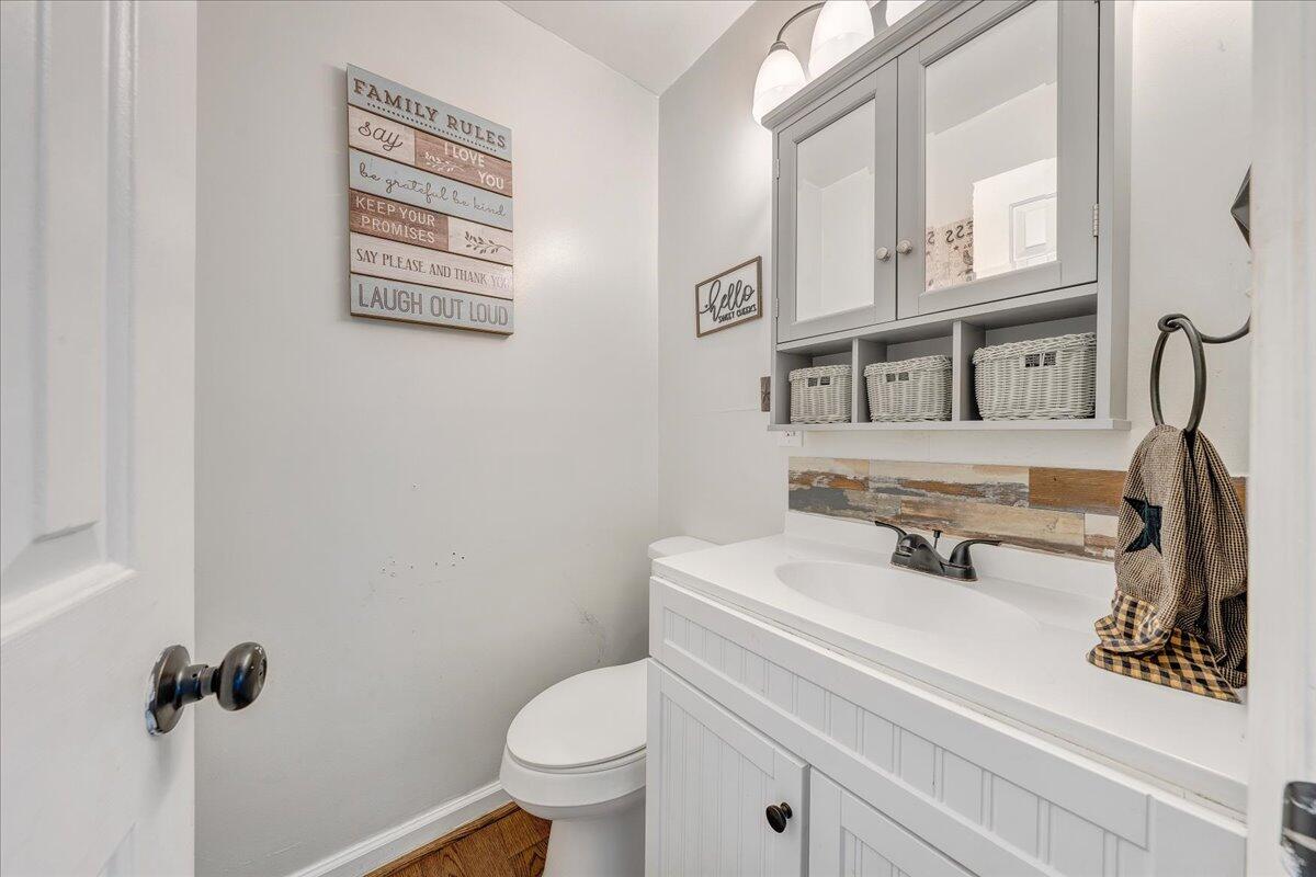 65 Avon Street Rocky Mount, VA 24151 - Photo 12 of 46 a bathroom with a sink and a toilet