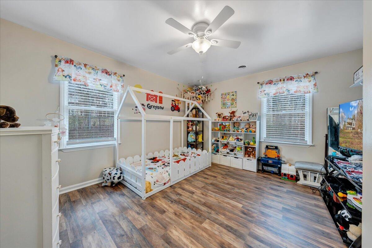 65 Avon Street Rocky Mount, VA 24151 - Photo 13 of 46 a view of a workspace with furniture and a flat screen tv