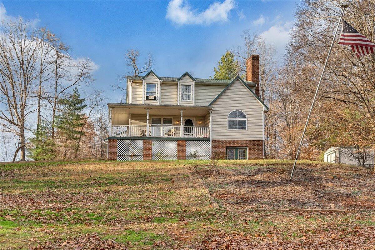 65 Avon Street Rocky Mount, VA 24151 - Photo 2 of 46 a front view of a house with a yard
