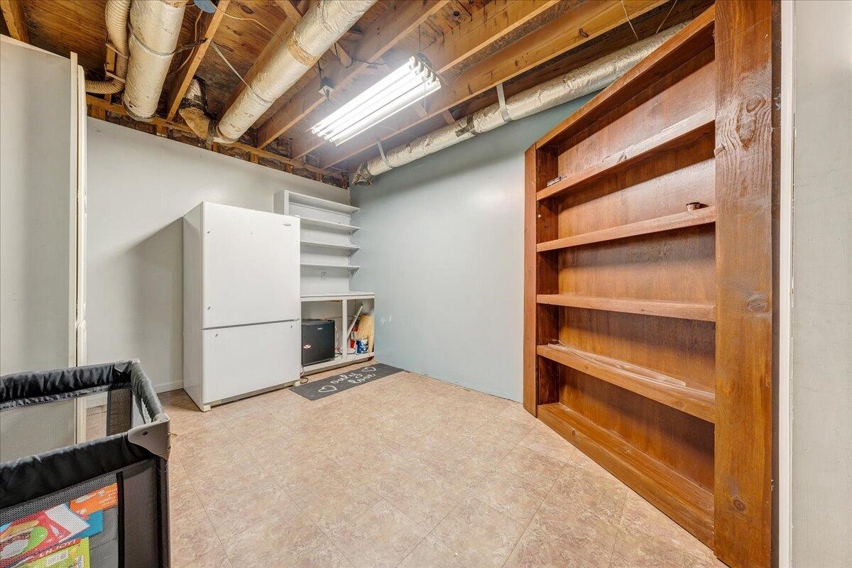 65 Avon Street Rocky Mount, VA 24151 - Photo 23 of 46 a view of an empty room with a cabinet
