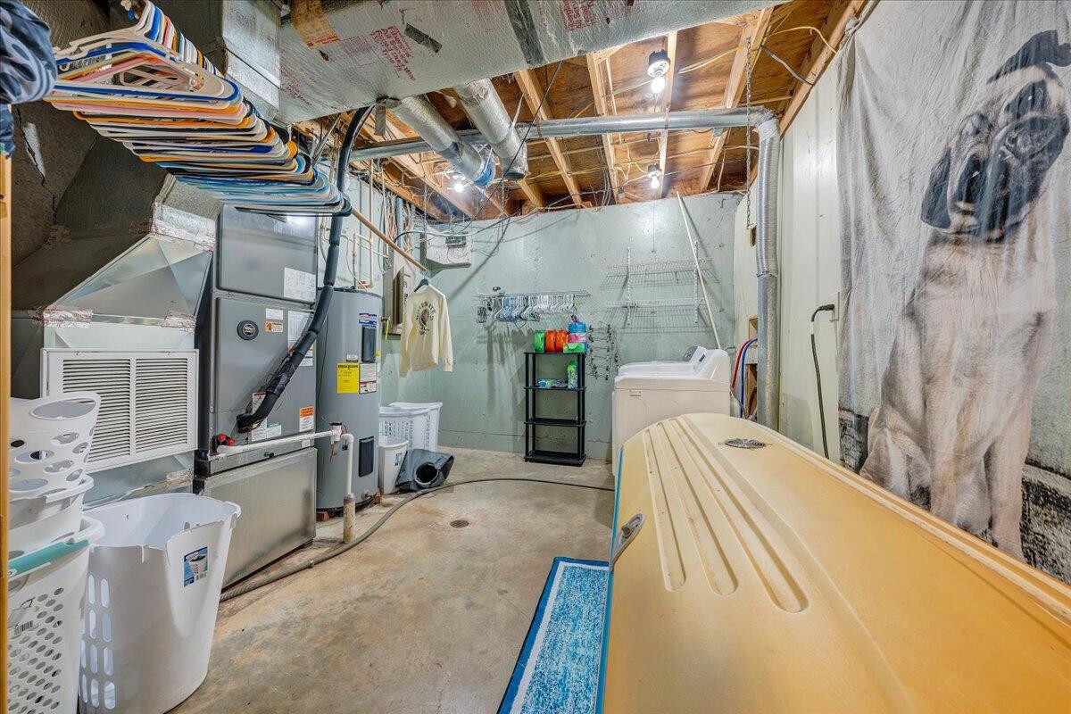 65 Avon Street Rocky Mount, VA 24151 - Photo 24 of 46 a bed room with a bed and a couch