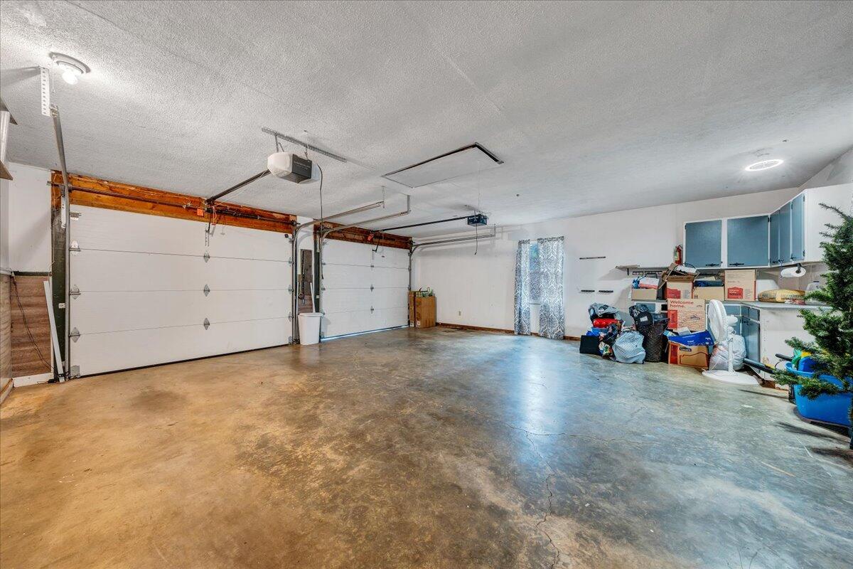 65 Avon Street Rocky Mount, VA 24151 - Photo 28 of 46 a view of a garage with rack and bicycle