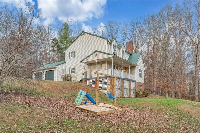 a view of balcony with furniture