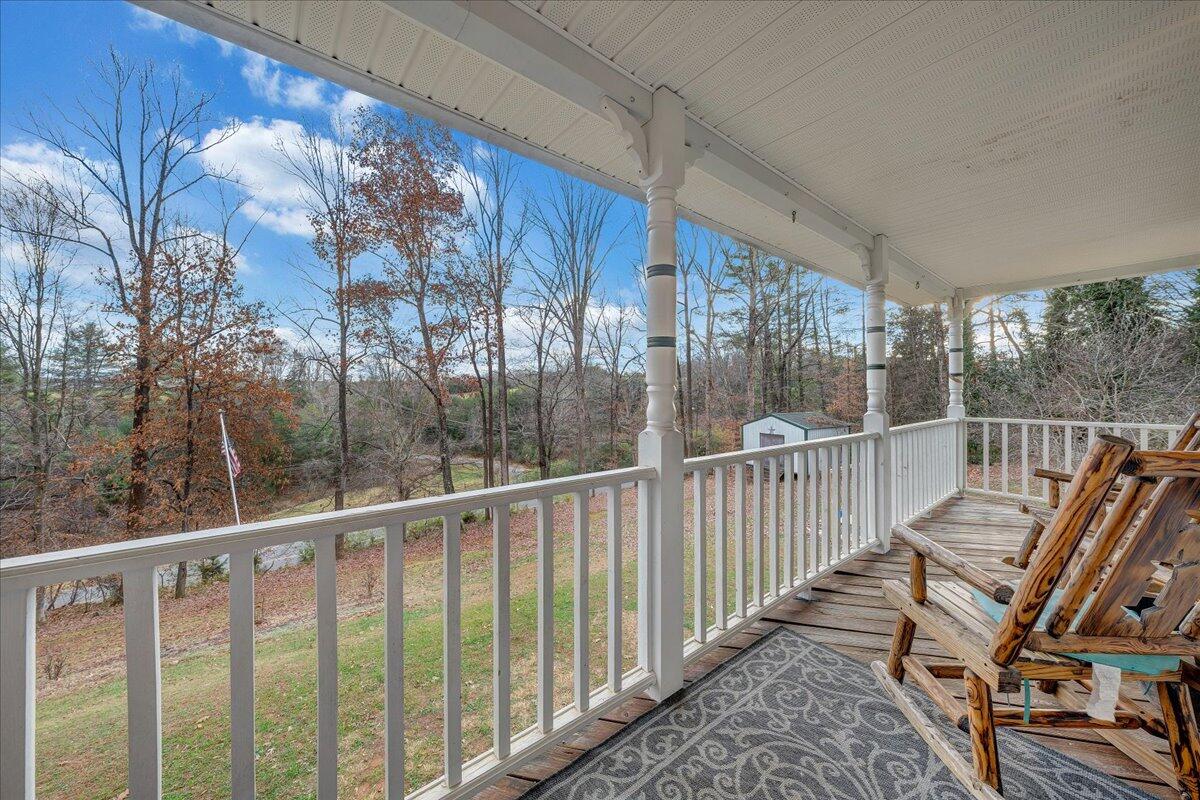 65 Avon Street Rocky Mount, VA 24151 - Photo 36 of 46 a view of balcony with wooden floor and fence