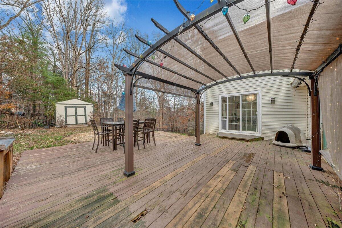 65 Avon Street Rocky Mount, VA 24151 - Photo 42 of 46 a view of a livingroom with wooden floor and furniture