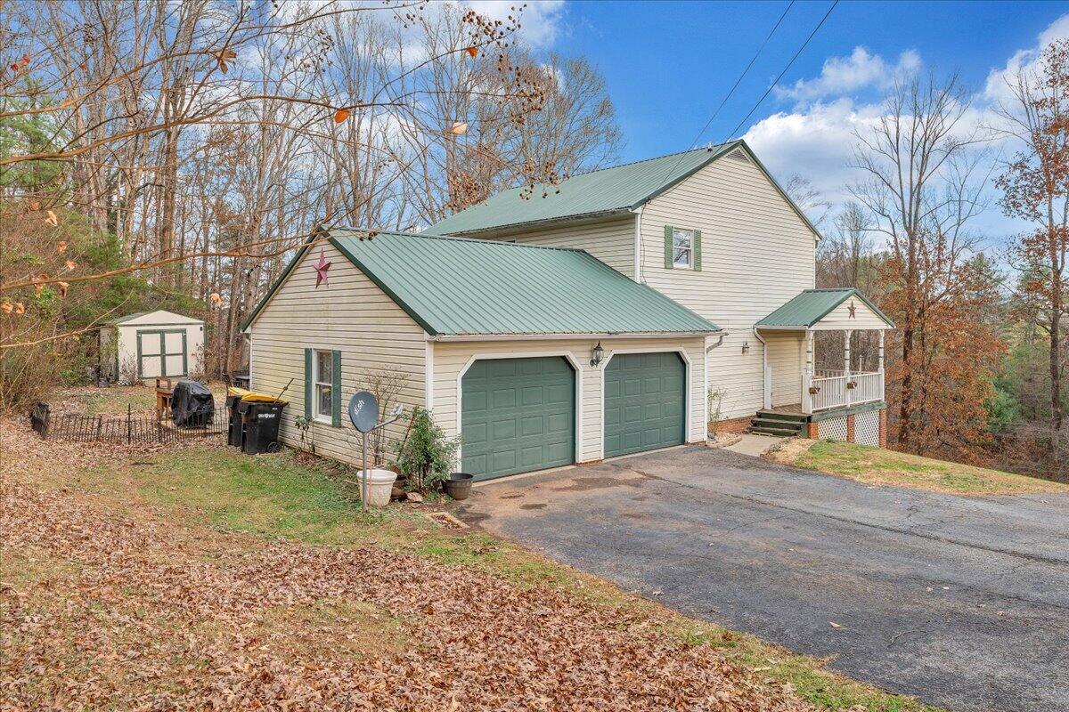 65 Avon Street Rocky Mount, VA 24151 - Photo 46 of 46 a view of a house with a patio