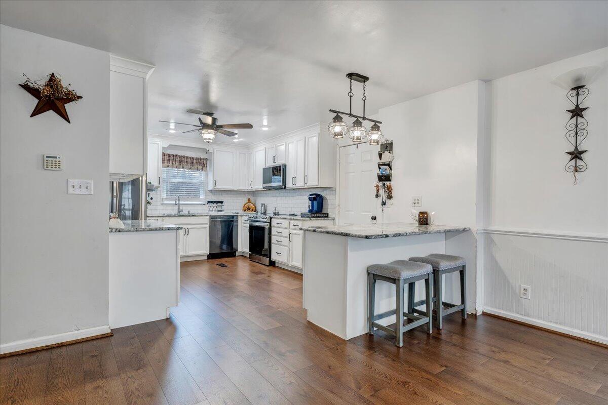 65 Avon Street Rocky Mount, VA 24151 - Photo 6 of 46 a view of kitchen with table and chairs