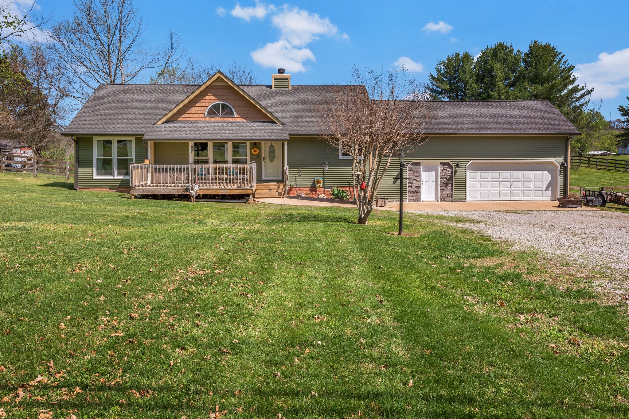 1006 Rip Steele Road Columbia, TN 38401 - Photo 1 of 26 a front view of a house with a garden