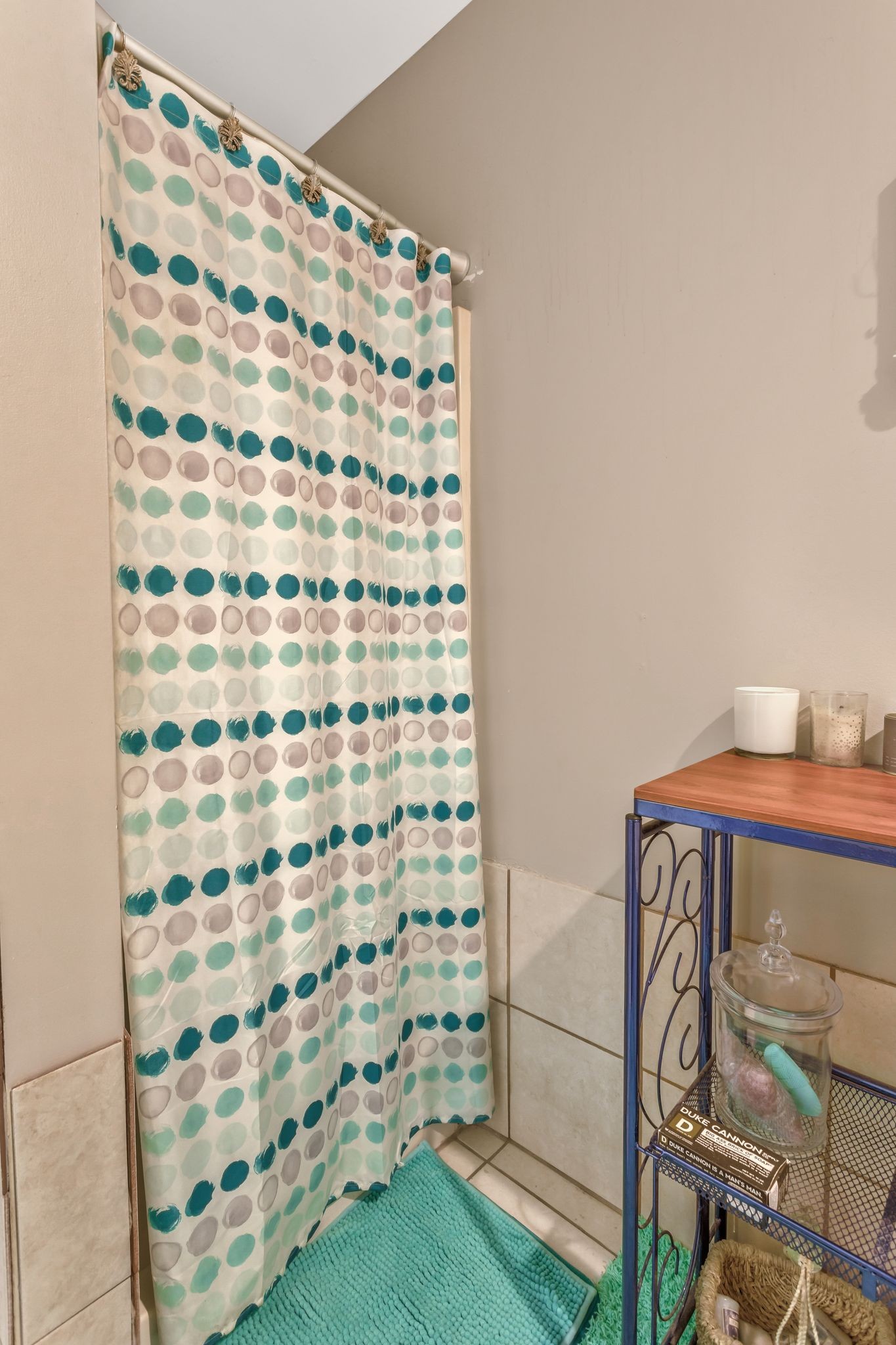 1006 Rip Steele Road Columbia, TN 38401 - Photo 12 of 26 a bathroom with a shower curtain