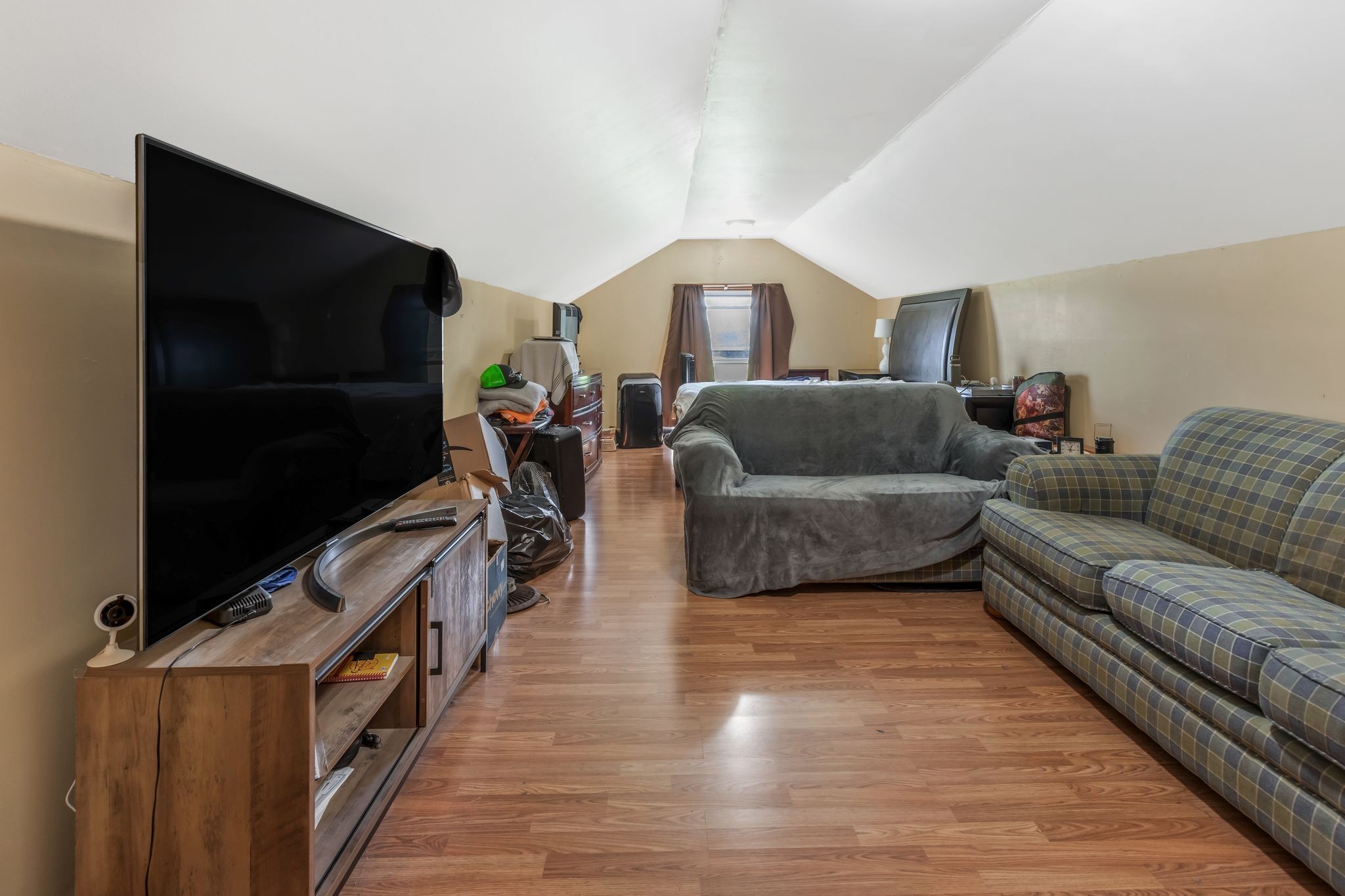 1006 Rip Steele Road Columbia, TN 38401 - Photo 18 of 26 a living room with furniture and a flat screen tv