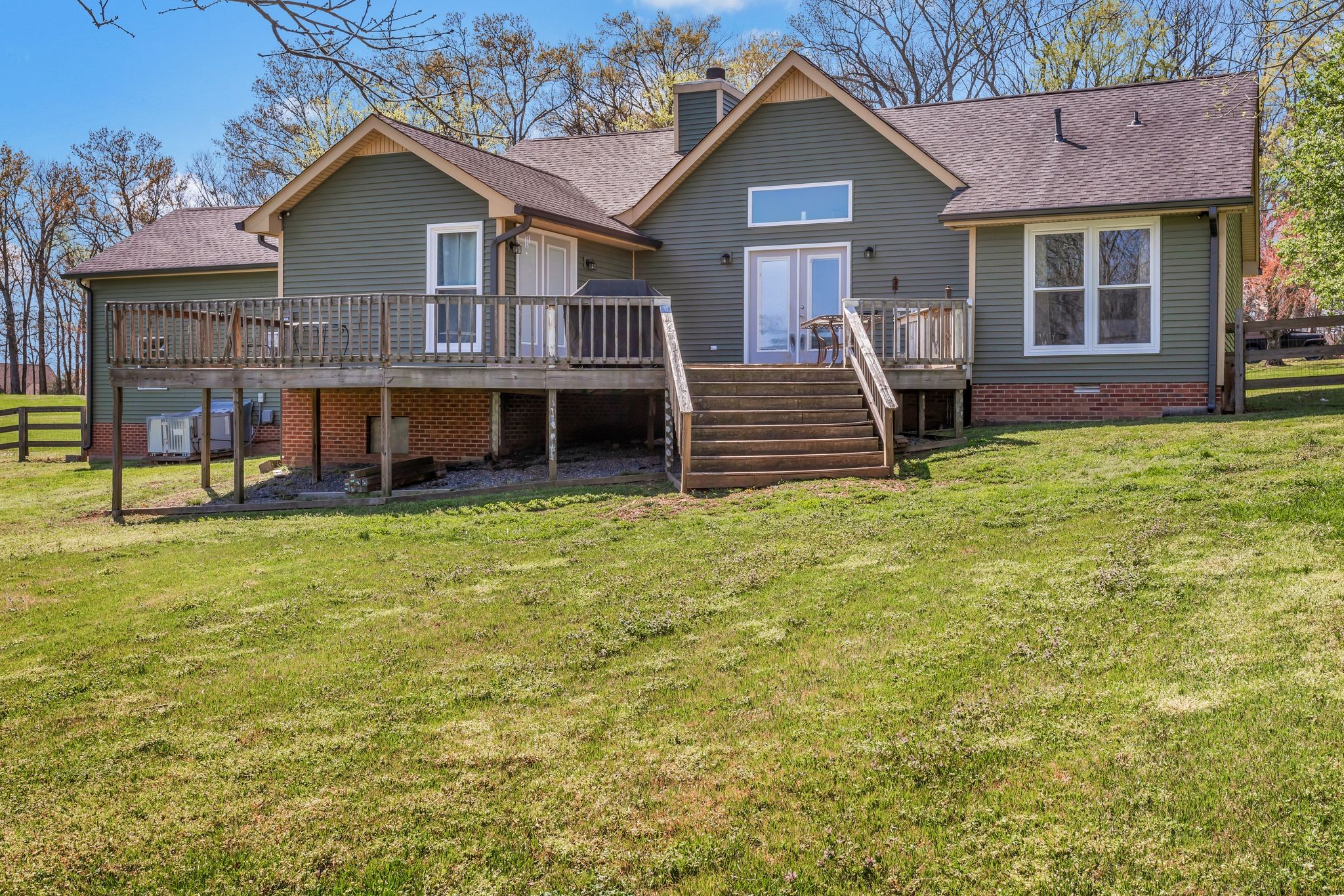 1006 Rip Steele Road Columbia, TN 38401 - Photo 19 of 26 a view of a house with wooden floor and a yard