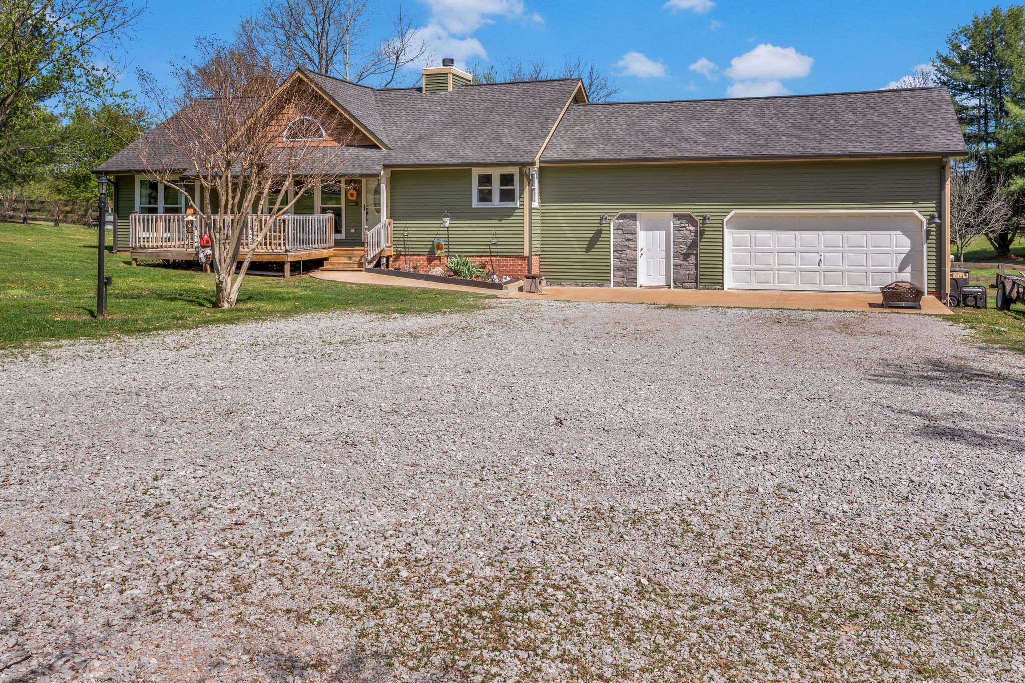 1006 Rip Steele Road Columbia, TN 38401 - Photo 2 of 26 a front view of a house with a yard