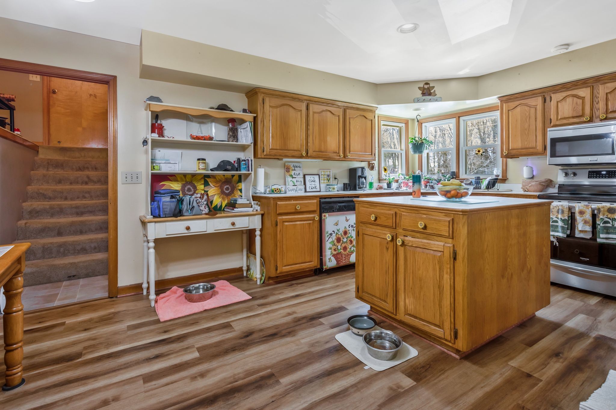 1006 Rip Steele Road Columbia, TN 38401 - Photo 7 of 26 a living room with stainless steel appliances furniture a rug and a kitchen view