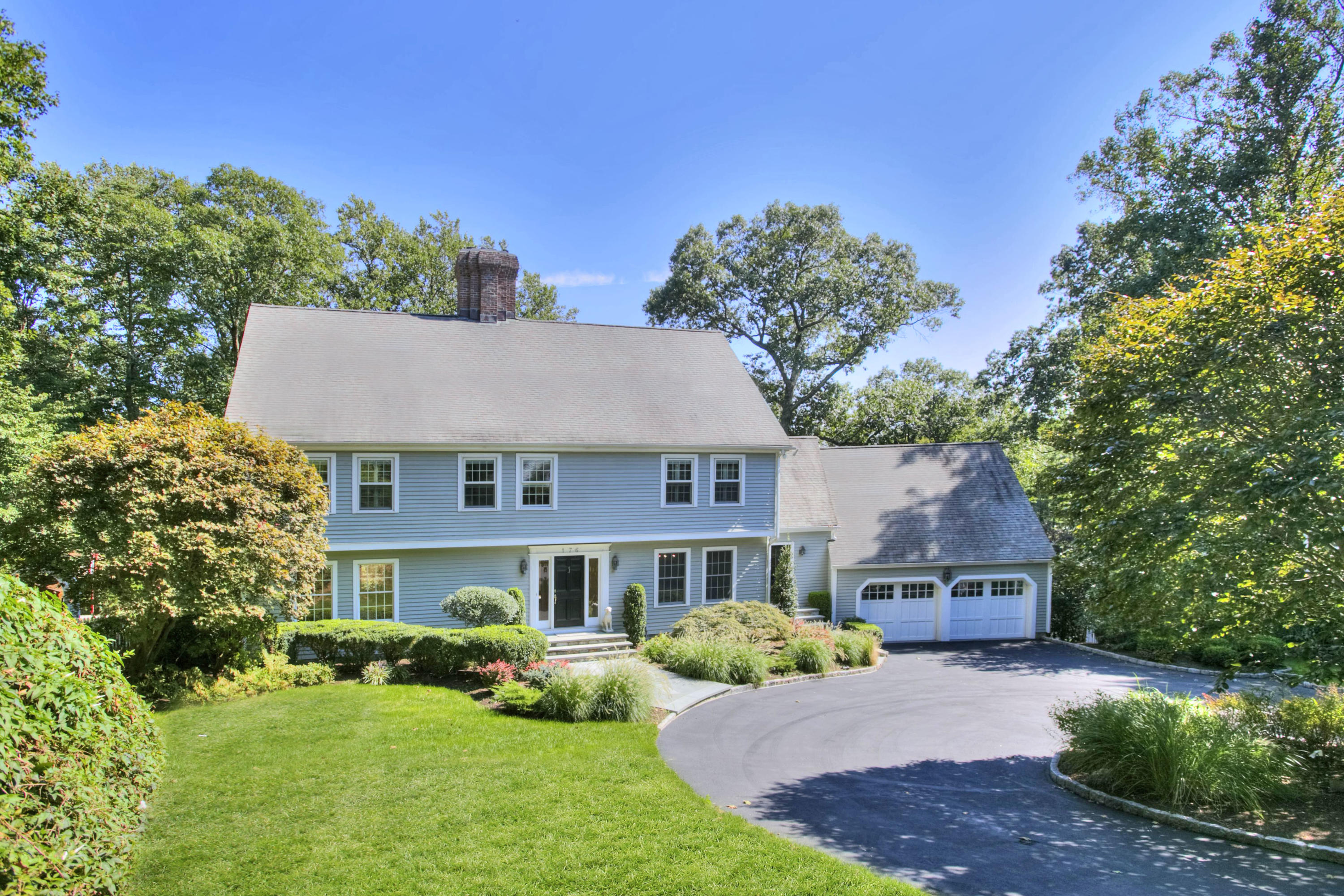 176 Marshall Ridge Road New Canaan, CT 06840 - Photo 1 of 29 front view of a house with a yard