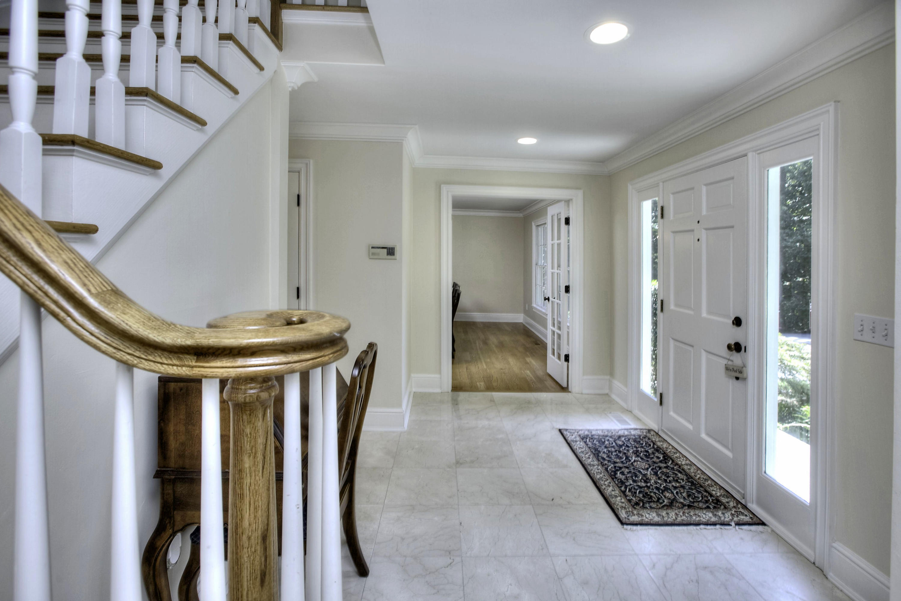 176 Marshall Ridge Road New Canaan, CT 06840 - Photo 2 of 29 a view of entryway and hall with wooden floor